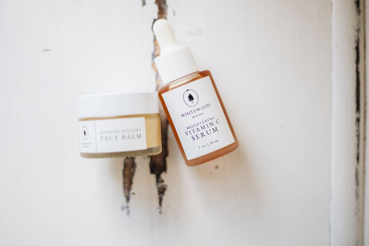 Skincare products — a face balm and vitamin C serum